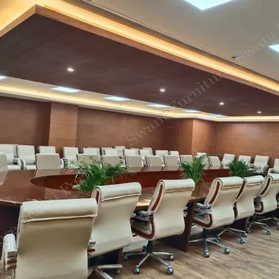 A wide view of the boardroom I completed for NBCC. This turnkey project involved creating a cohesive and impressive space with custom-made furniture and interior finishes to meet the highest standards.
