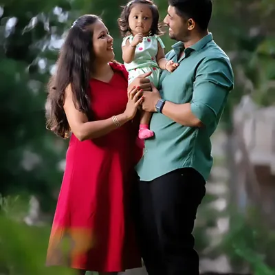 Our goal in a family session is to capture the authentic love you share. We guide you into natural interactions rather than stiff poses, resulting in warm and genuine family photos.