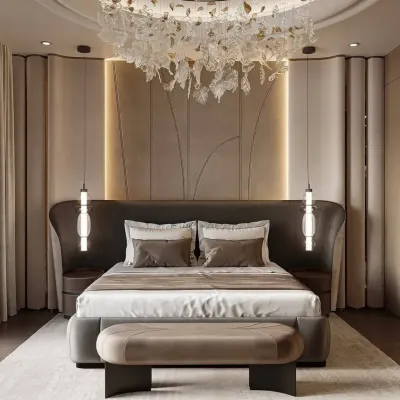 An ultra-luxurious master bedroom featuring a dramatic winged headboard, exquisite pendant lights, and a custom chandelier. This is where we turn your bedroom into a personal five-star suite.