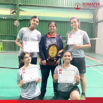 Our K. J. Somaiya Polytechnic Women’s Badminton Team celebrates being crowned champions of the Inter-Zonal State Level Tournament, proudly holding their trophy and certificates.