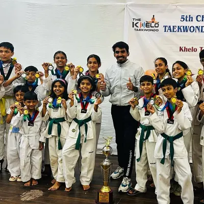 Our team proudly displaying their medals and the 2nd place trophy at the 5th Champions Trophy Championship in 2023. A fantastic team effort.
