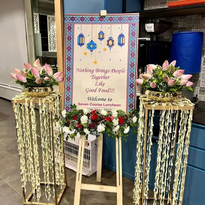 The welcome setup for a seven-course luncheon I hosted for Canara HSBC's special international guests. The elegant floral decor and personalized signage set the tone for a sophisticated dining experience.
