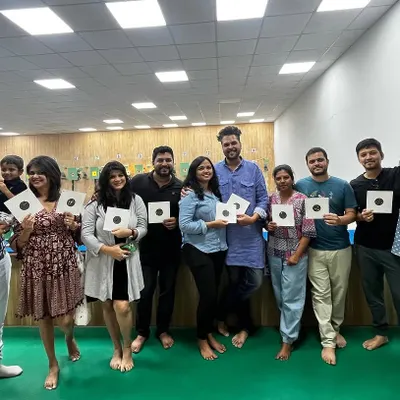 A group of friends and family members celebrate a fun session at our range. It's a great way to bond and create lasting memories together.