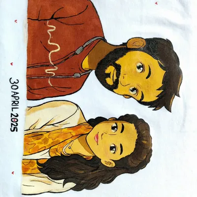 A close-up of the hand-painted couple portrait on a t-shirt. I use high-quality fabric paints to ensure the artwork is durable and the colors stay vibrant even after washing. The date marks a special anniversary.