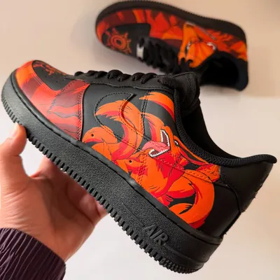 A close-up of the Kurama Nine-Tails custom Nike Air Force 1s. This angle shows the flaming tails wrapping around the side of the shoe, creating a sense of dynamic motion.