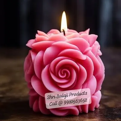 A close-up of a stunning, deep pink rose ball candle. The intricate petal details are achieved using our high-quality silicone molds, and I teach the right techniques for a flawless finish.