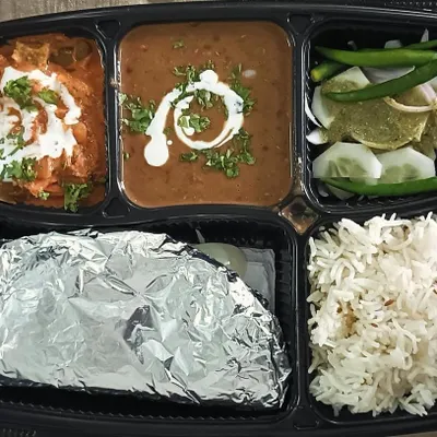 A rich and satisfying thali featuring creamy Dal Makhni and our special Kadai Paneer. This combination is a weekend favorite, packed with flavor and served with rice, roti, and salad.