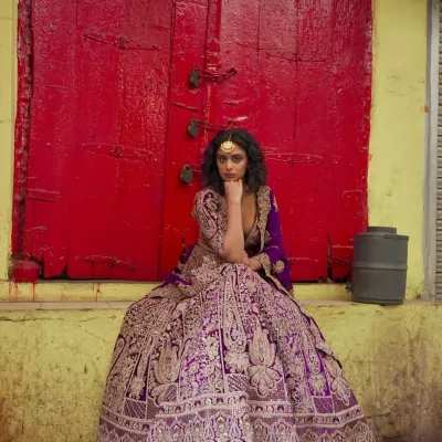 This is for the bride who dreams of a royal wedding. A magnificent purple lehenga with incredibly detailed gold embroidery, designed to make you feel like you’ve stepped out of a palace.