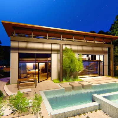 This modern home design seamlessly blends indoor and outdoor living. The clean lines of the architecture are softened by bamboo planting and a multi-level pool. My work extends beyond just plants; I design the entire exterior experience, including hardscaping and layout, to create a cohesive and beautiful environment.