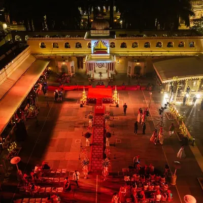 An aerial perspective of a grand wedding setup at Jagmandir Island Palace, showcasing how I utilize the vast courtyards of heritage venues to create a regal atmosphere for your celebrations.