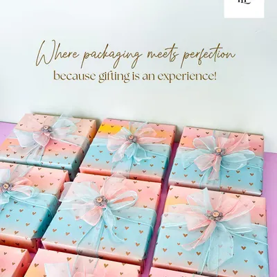 Where packaging meets perfection. I believe gifting is an experience, and that starts with the wrap. These beautifully wrapped boxes with delicate ribbons are ready to make a lasting impression.