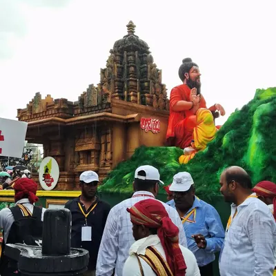 This float, featuring a sage before a temple, is one of my proudest creations. I designed it for a major festival parade, focusing on the intricate details of the temple structure and the peaceful expression of the sage to create a powerful, moving spectacle.