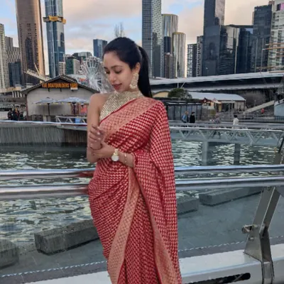 Our client takes her mother's exquisite red Banarasi saree to the streets of Melbourne, proving that tradition is glamorous anywhere in the world.