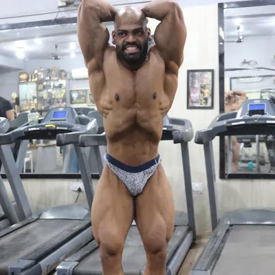 Ram Ram Bhai Saryanu. The vacuum pose is a hallmark of classic physique. It demonstrates incredible core control and creates the illusion of a smaller waist, enhancing the V-taper. We practice this until it becomes second nature.