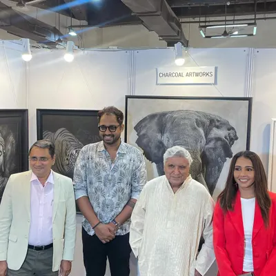 A cherished moment with the legendary Javed Akhtar saab and other guests at my exhibition booth. His presence was a great honor.