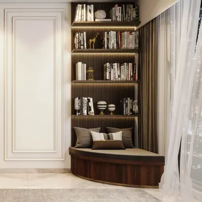 We turned this corner into a reader's paradise with a custom-built curved window seat and an integrated, backlit bookshelf. It's the perfect spot to get lost in a good book.