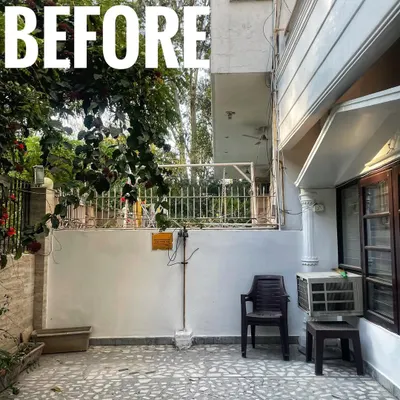 A typical empty courtyard space, waiting for a touch of green. This was our starting point for a Noida home makeover.