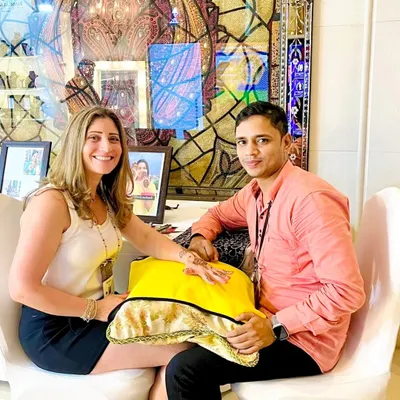 This is me, Vivek, with a happy client. For me, mehndi is not just a job, it is an emotion. Every design I create is a story, and I am grateful to be the one to draw it for you.