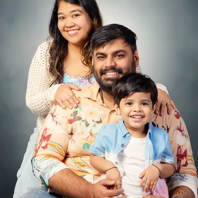 A beautiful, classic family portrait. My goal is to create timeless images that capture the warmth and love your family shares.