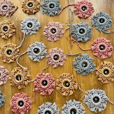 I customized this large batch of macrame evil eye mini wall hangings for a client to use as return favors. They are a beautiful and meaningful gift to give to guests on a special occasion.