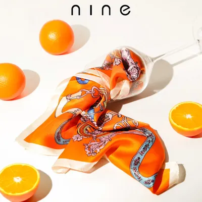 Add a splash of color and personality with our collection of silk pocket squares. This vibrant orange design is perfect for complementing a navy or grey suit.
