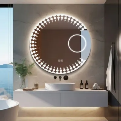 A look at our custom circular LED mirror, designed for a modern bathroom. This piece features a stylish dotted backlight pattern for even illumination and an integrated magnifying circle for detailed grooming. We can customize the size, light temperature, and add smart features like defoggers.