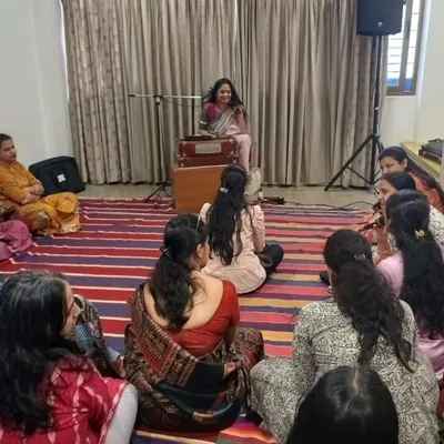 Leading a Bhavageethe workshop for a group of enthusiastic learners. In these sessions, we sit together, discuss the nuances of poetry, and I guide the participants through the melodies of beloved Kannada songs.