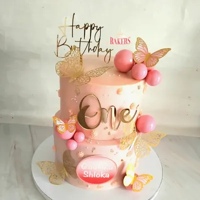 A special cake for a special celebration! This butterfly-themed two-tier cake was made for Gaurika and Shloka’s first birthday. The pink and gold design with delicate butterflies was a complete showstopper.