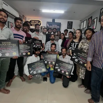The proud and certified students from our March batch, holding their certificates of completion. This group is ready to take the next step in their tattoo careers.
