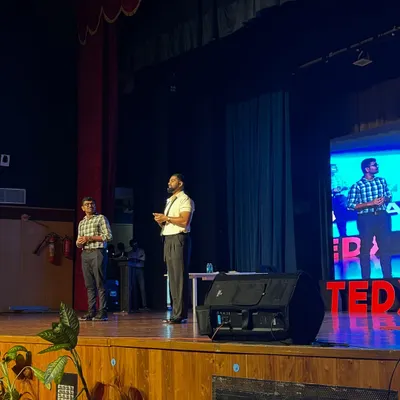 On stage during my 4th TEDx performance, this one for TEDxSABVMCRI. These talks allow me to share the deeper concepts behind my magic with an engaged and curious audience.