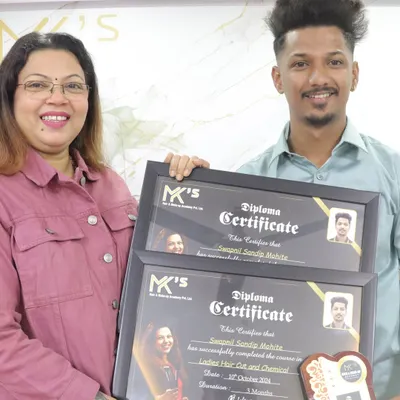 A proud moment, awarding a student with diplomas for successfully completing the Ladies Hair Cut and Chemical courses. It's wonderful to see their dedication turn into professional skills.