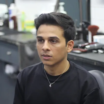 A clean, classic haircut for indie music sensation Anuv Jain. This is a candid shot from his visit to my shop, showing the final result of a simple yet stylish look that complements his artistic persona.