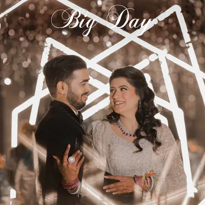 A perfect portrait from a glamorous Sangeet night. We used the modern, geometric light decor as a stunning backdrop to create a stylish and romantic image of the couple.