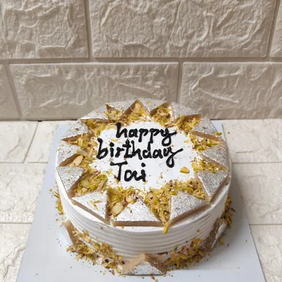 My Kaju Katli Cake is the ultimate fusion dessert. This one was for a special "Happy Birthday Tai," combining the love for traditional Indian sweets with a classic celebration cake.