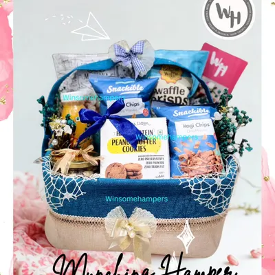 My "Munching Hamper" is perfect for the ultimate snack lover. This denim and jute basket is filled with Snackible chips, protein cookies, and waffle crisps for a gourmet experience.