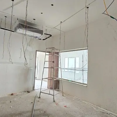 The beginning of a transformation. This is a "before" shot of a bare room in Nellore, ready to be converted into a luxury home cinema.