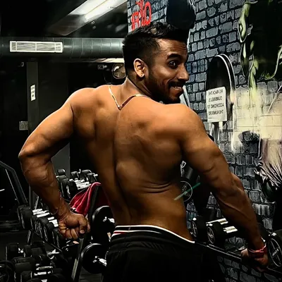You don't have to be great to start, but you have to start to be great. This back pose shows the results of years of disciplined training.