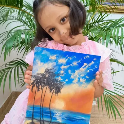 This stunning beach scene was painted by Bella. Her use of color to capture the sunset is incredible, and this is one of the many beautiful pieces from our young artists that you can choose for your merchandise.