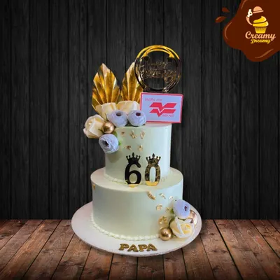 Celebrating 60 years in style. This two-tier cake for "Papa" features elegant gold accents, a custom logo, and delicate sugar flowers, marking a significant milestone with sophistication.