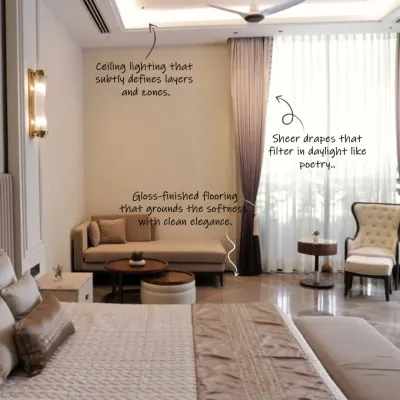 Every detail in this bedroom speaks of calm luxury. We used layered ceiling lighting, sheer drapes to filter daylight, and gloss finished flooring to create a harmonious and elegant space.