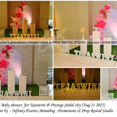 A simple and elegant baby shower for Tejaswini at Prestige Jindal City. The decor features a clean, modern arch with a pink balloon accent, creating a sophisticated and welcoming atmosphere for the celebration.
