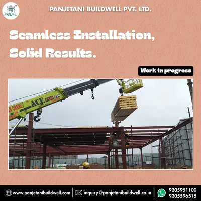 A crane lifts a stack of PUF roof panels for installation at the 18,710 sq. ft. Experion project in Gurgaon. This demonstrates our seamless installation process for solid, reliable results.