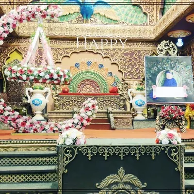 For a truly grand celebration, I designed this opulent, palace-themed stage for a naming ceremony. The setup includes a decorated cradle, intricate backdrop, and royal seating, making the event unforgettable.