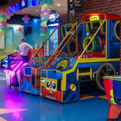 A glimpse of our vibrant arcade area, featuring a variety of games to challenge kids and adults alike. The bright lights and sounds create an exciting atmosphere.
