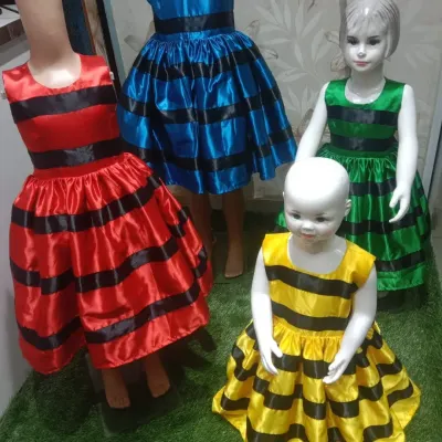 I created these colorful balloon frocks as part of a bulk order for a school performance.