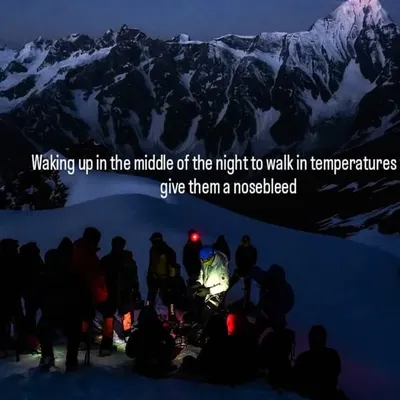 A team gathers under headlamps for a pre-dawn summit push. In the freezing cold, you rely on the warmth of your team. These are the friends you make in high places.
