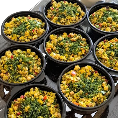 This is my Moroccan Couscous Salad, packed with flavor and texture. I combine fluffy couscous with tender chicken, sweet cranberries, raisins, nuts, and crisp bell peppers for a truly satisfying meal.