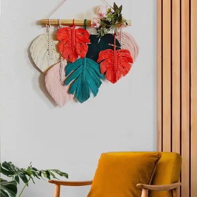 Here is an example of a beautiful macramé wall hanging you can create using my Monstera leaf stencils and colorful cotton cords. It adds such a vibrant, tropical feel to any room.