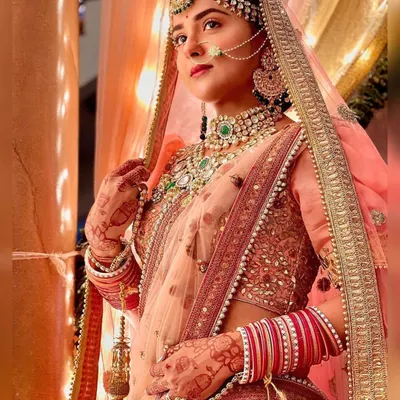 A beautiful shot of actress Debattama Sah in a bridal look I created for her popular TV show. The look featured a matha patti, nath, and detailed jewelry that I worked with to perfect her on-screen character.