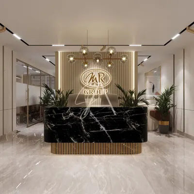 The reception desk for the MR Group, featuring a bold black marble front and fluted wood base. We used warm backlighting and elegant globe pendant lights to create a powerful and sophisticated entry point for this corporate office in Defence Colony.